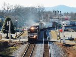 NS 2766 / SD70M-2 is leading a mixed freight train